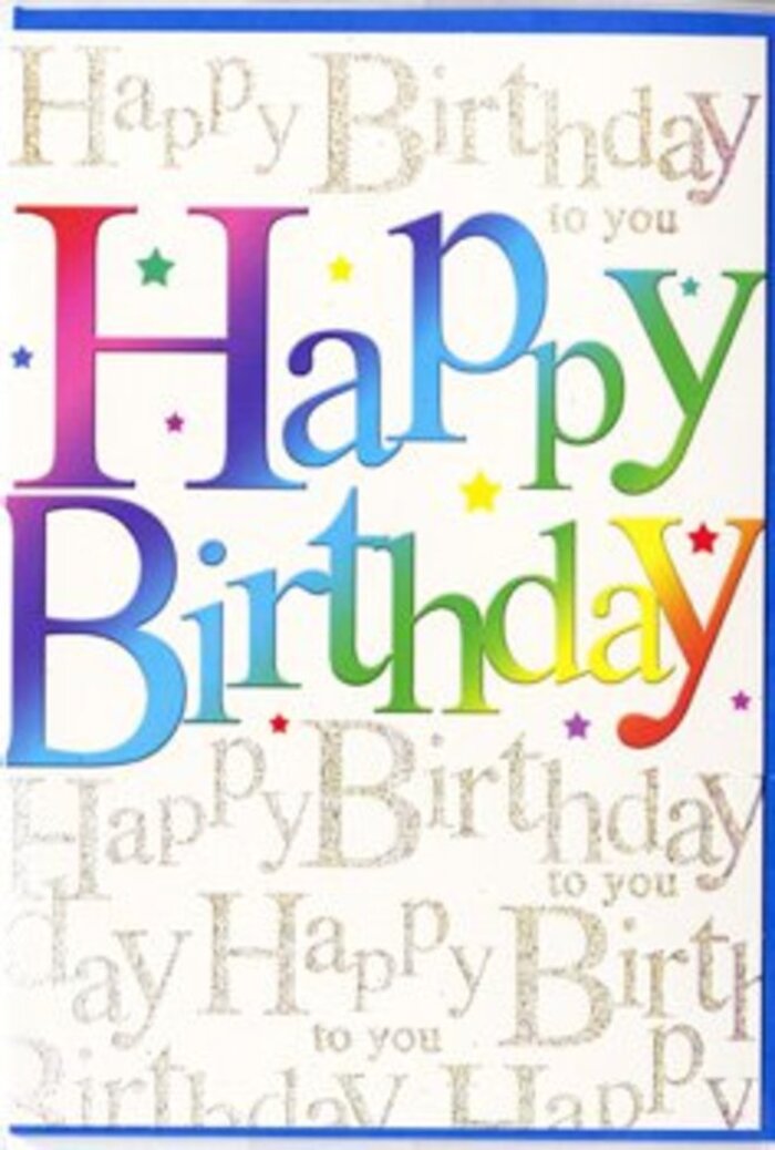 On this birthday card, the artwork brings together colour, texture, and warmth in a way that feels right at home in Rush Green, like a favourite local florist's display. The central Happy Birthday message stretches confidently across the front, each letter plump and rounded, edged with soft definition that helps it stand out. Within every character, a rainbow gradient moves smoothly from intense red and pink tones into cooler purples and blues, then on to aqua, fresh grassy green, and soft yellow, echoing the steady transition of colours in a carefully crafted bouquet. The blending is subtle and polished, so the eye naturally travels along the words, taking in the full spectrum. Behind this bold typography, the background is a warm, creamy white canvas filled entirely with looping lines of gold script that repeat the phrase Happy Birthday to you. The handwriting-style script is fine and flowing, with the letters connected in gentle waves, and the metallic ink appears to shimmer slightly, as though dusted with delicate glitter. This gold pattern fills the space without feeling busy, giving the card a sense of rhythm and movement, like music at a birthday gathering near Romford Road. Small star-like shapes and colourful specks are dotted around the main message, adding just enough playfulness to suggest balloons, streamers, or scattered party confetti. The card's surface looks smooth to the touch with a faint gloss, and the raised rainbow wording invites a fingertip to follow its curves. Overall, the design feels exuberant yet tasteful, a natural companion to fresh, bright stems sent for same-day delivery across Rush Green to mark someone's special day.